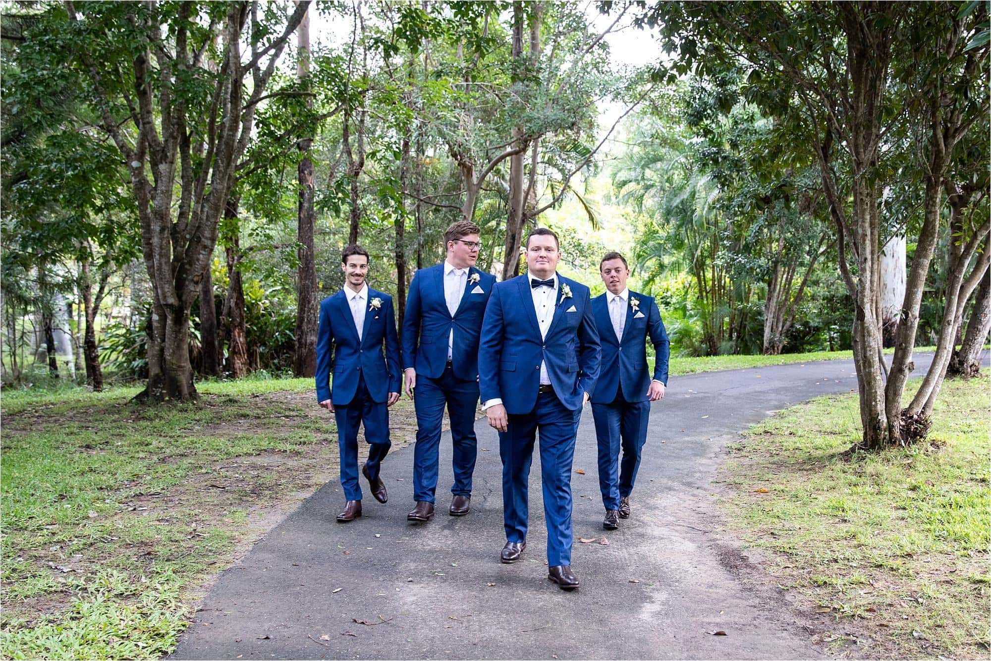 The boys walking to the wedding ceremony, at Coolibah Downs Private Estate, Gold Coast wedding venue.