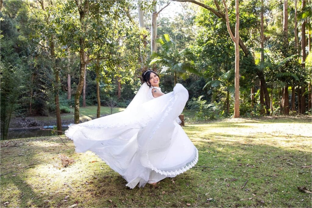 Songbirds Retreat Tamborine Mountain, bride twirling dress