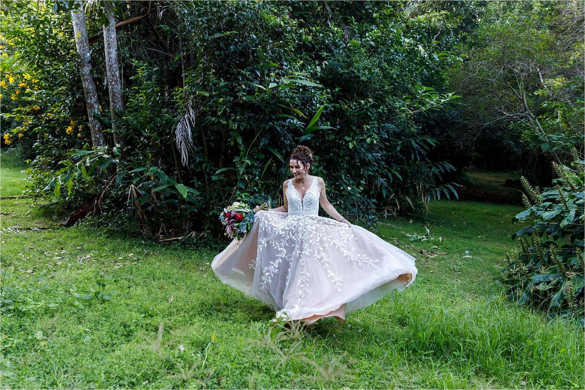 Bride twirling wedding dress.