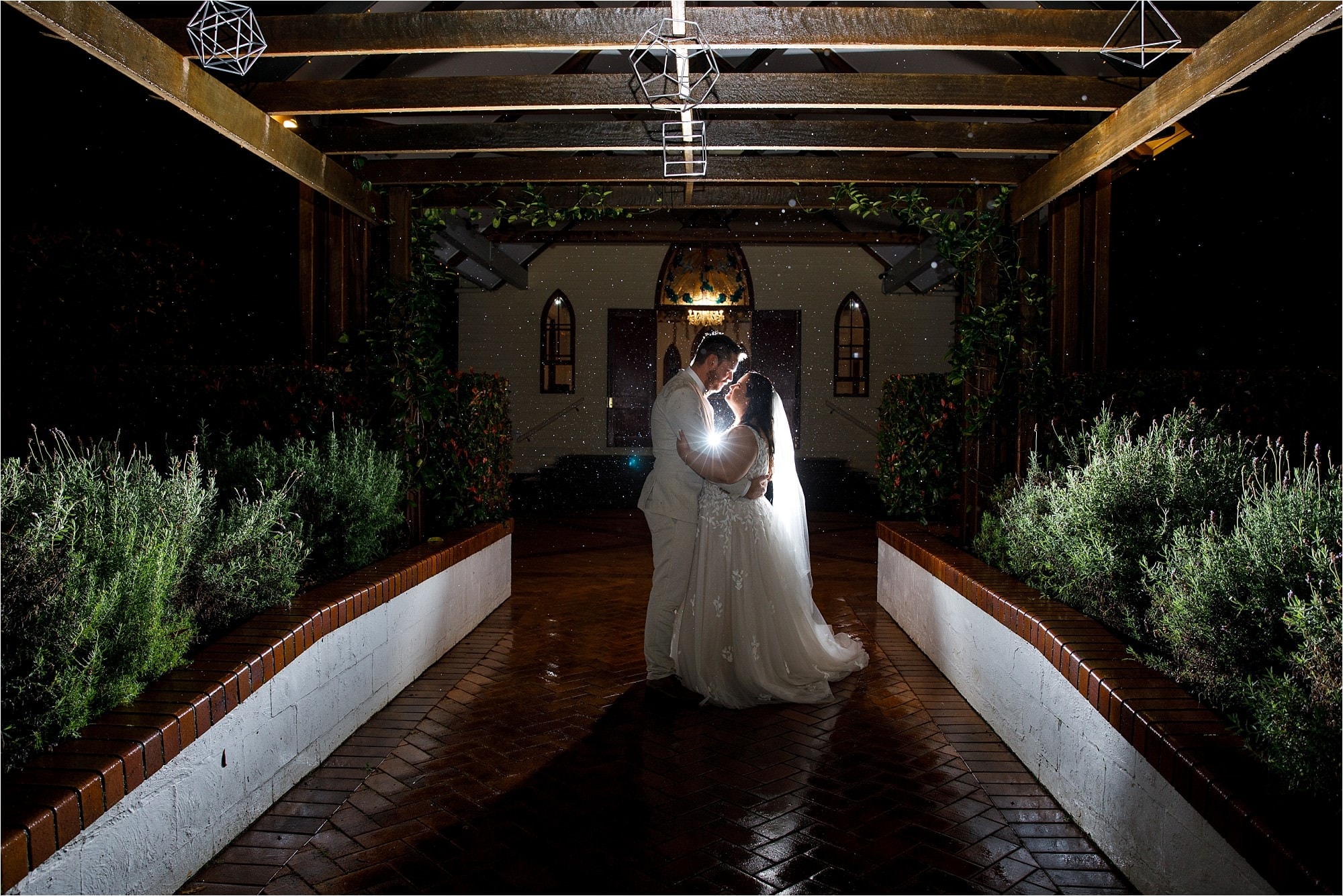 Wedding photography night image with lights by Mooi photography.