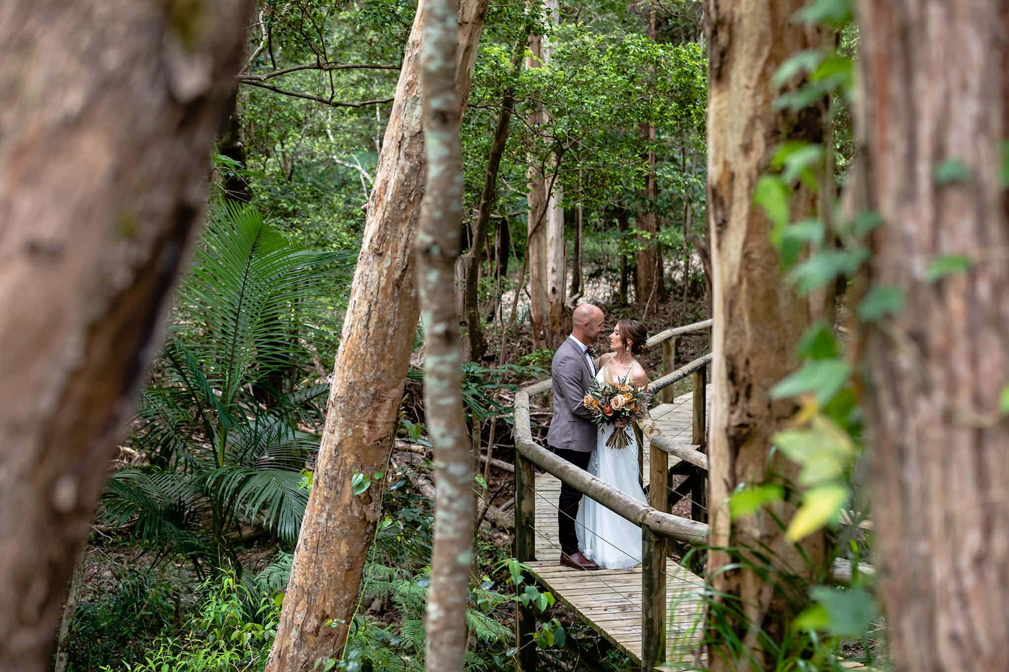 Coolibah Downs Private Estate Wedding Venue Bride and Groom on timber bridge by Bec Pattinson Photography Gold Coast Wedding Photographer
