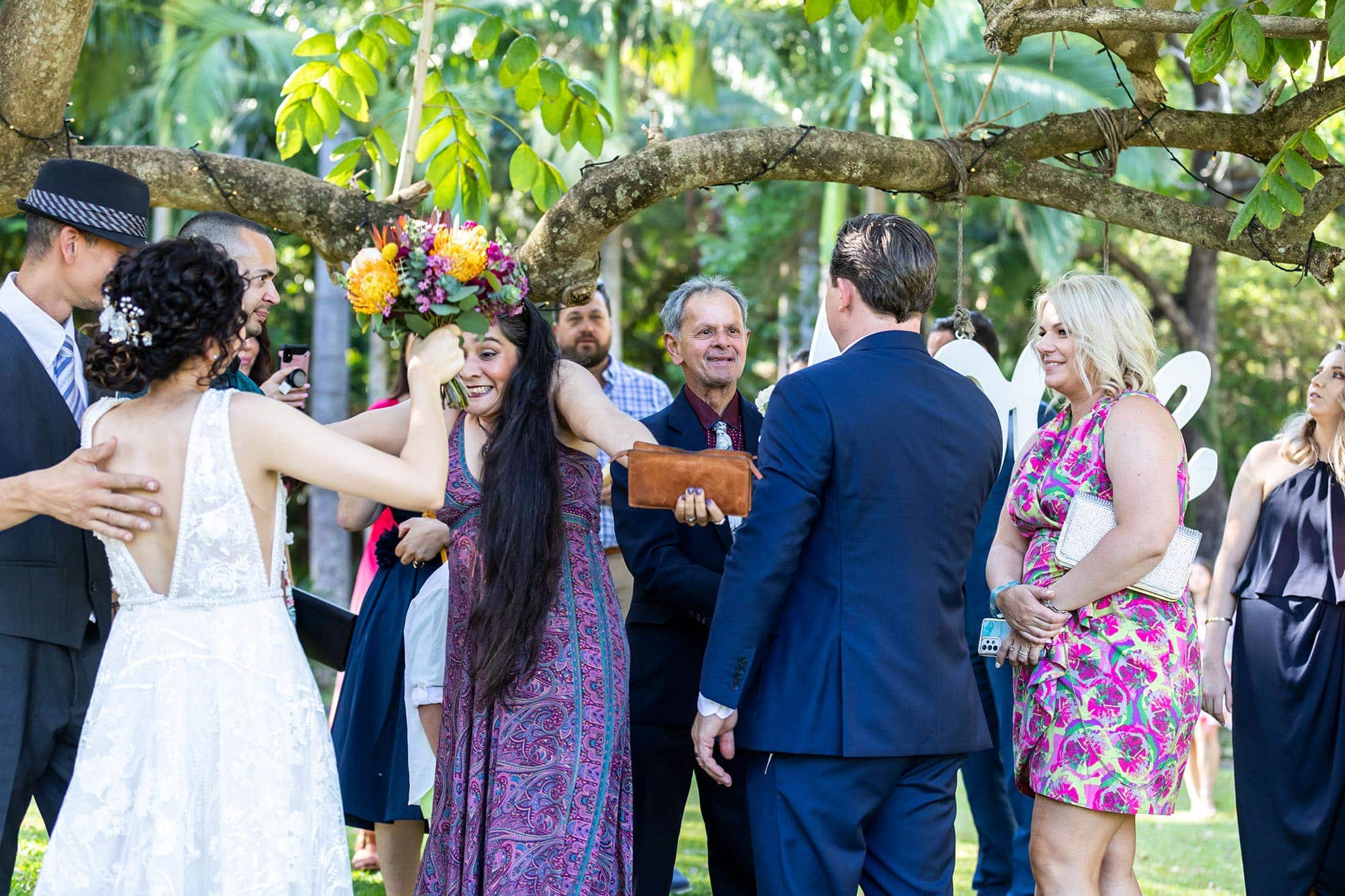 Candid congratulations with wedding guests after the Ceremony at Coolibah Downs under the love tree