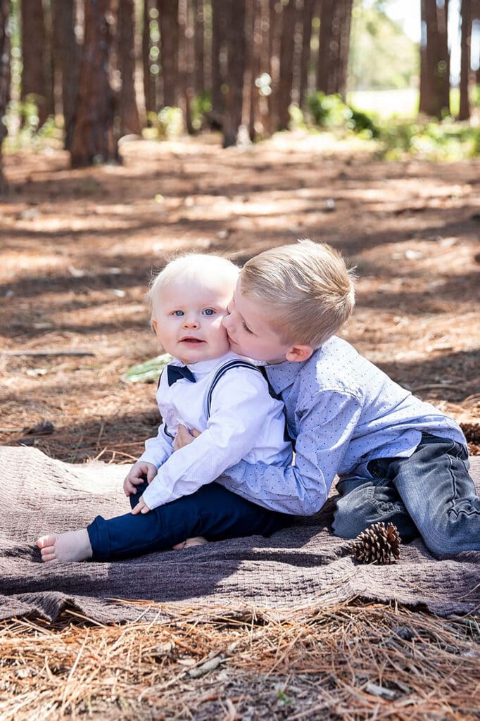 Two brothers having fun, with Gold Coast family photographer Mooi Photography.
