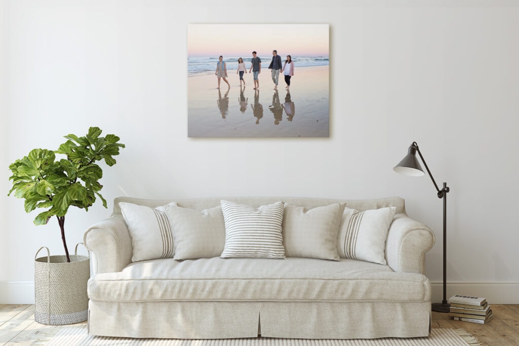 Family walking along a Gold Coast beach by family photographer Mooi Photography.