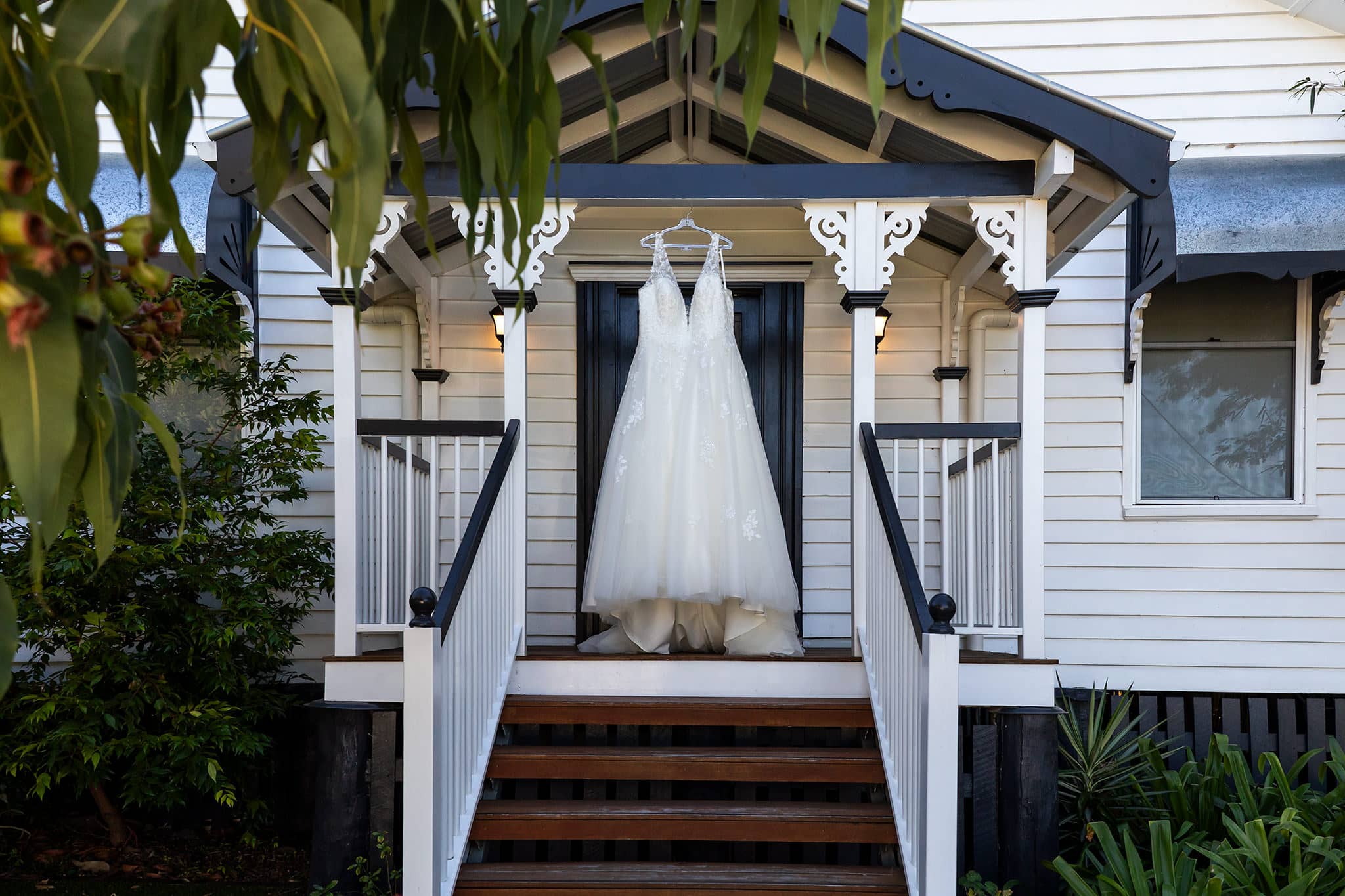 Bride dress hanging at Laurenvale Estate, Scenic Rim Wedding Venue, by Mooi Photography.
