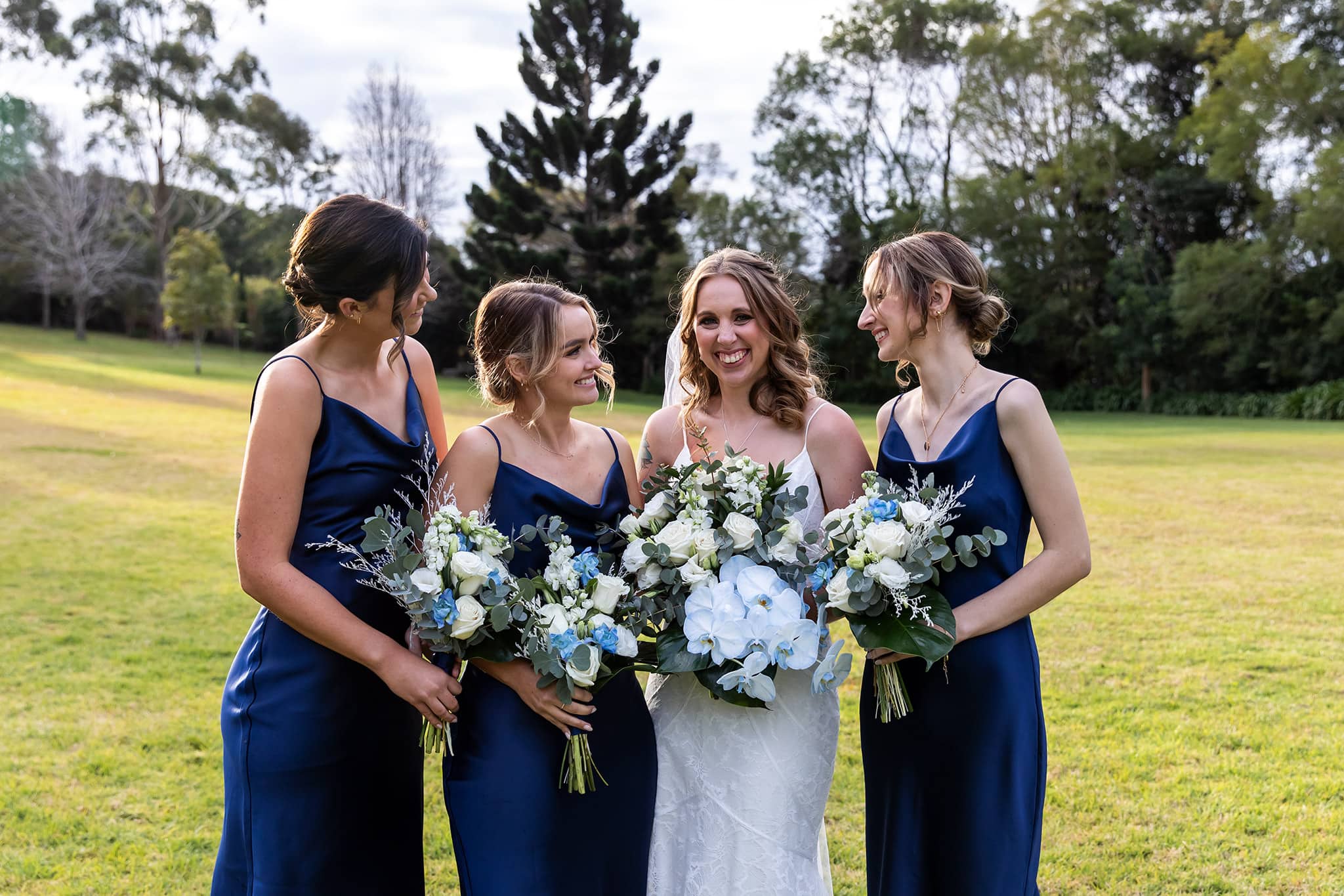 Bride and bridesmaids at The Secret Garden Estate on Tamborine Mountain, by Mooi Photography.