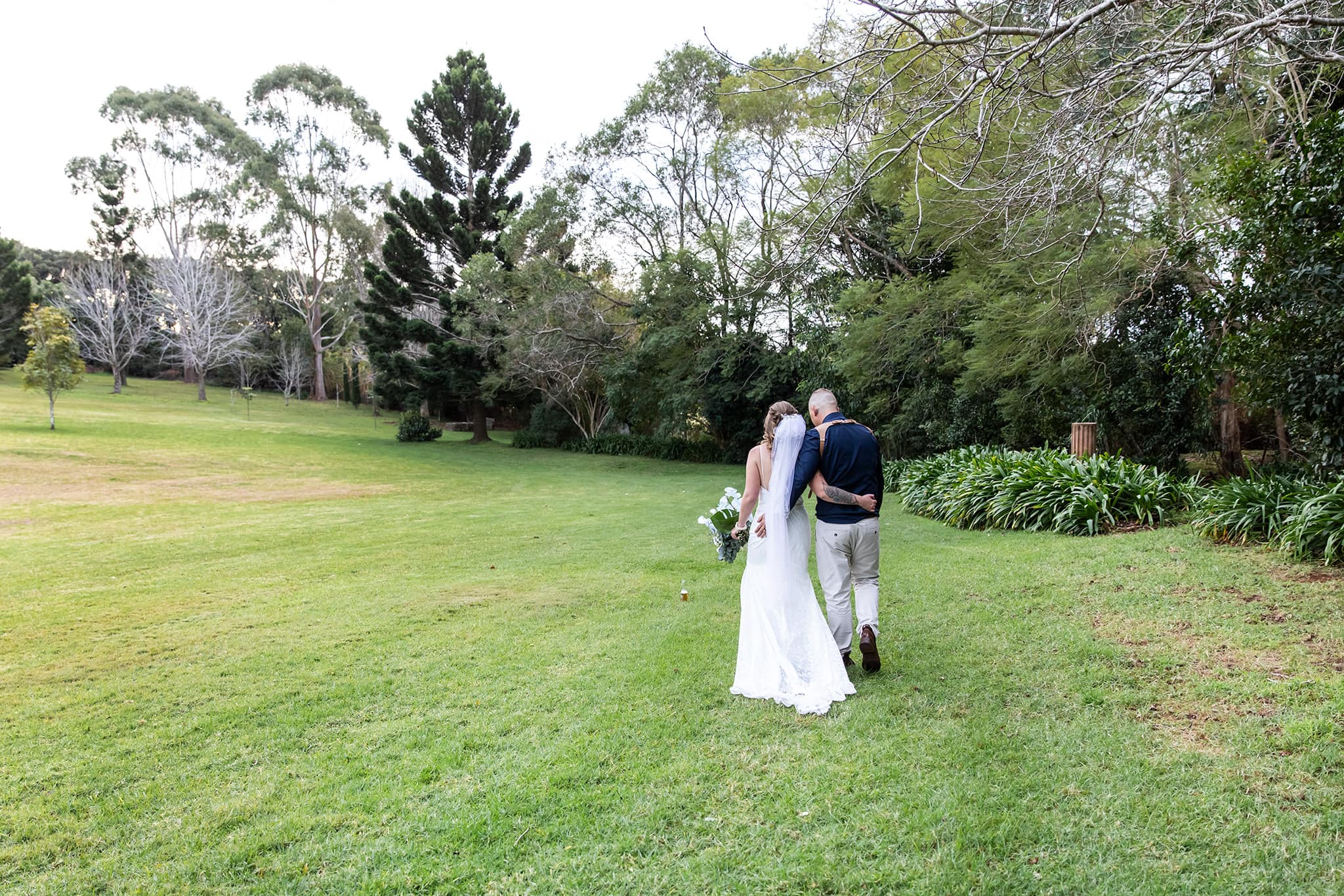 Bride and groom married at The Secret Garden Estate on Tamborine Mountain, by Mooi Photography.