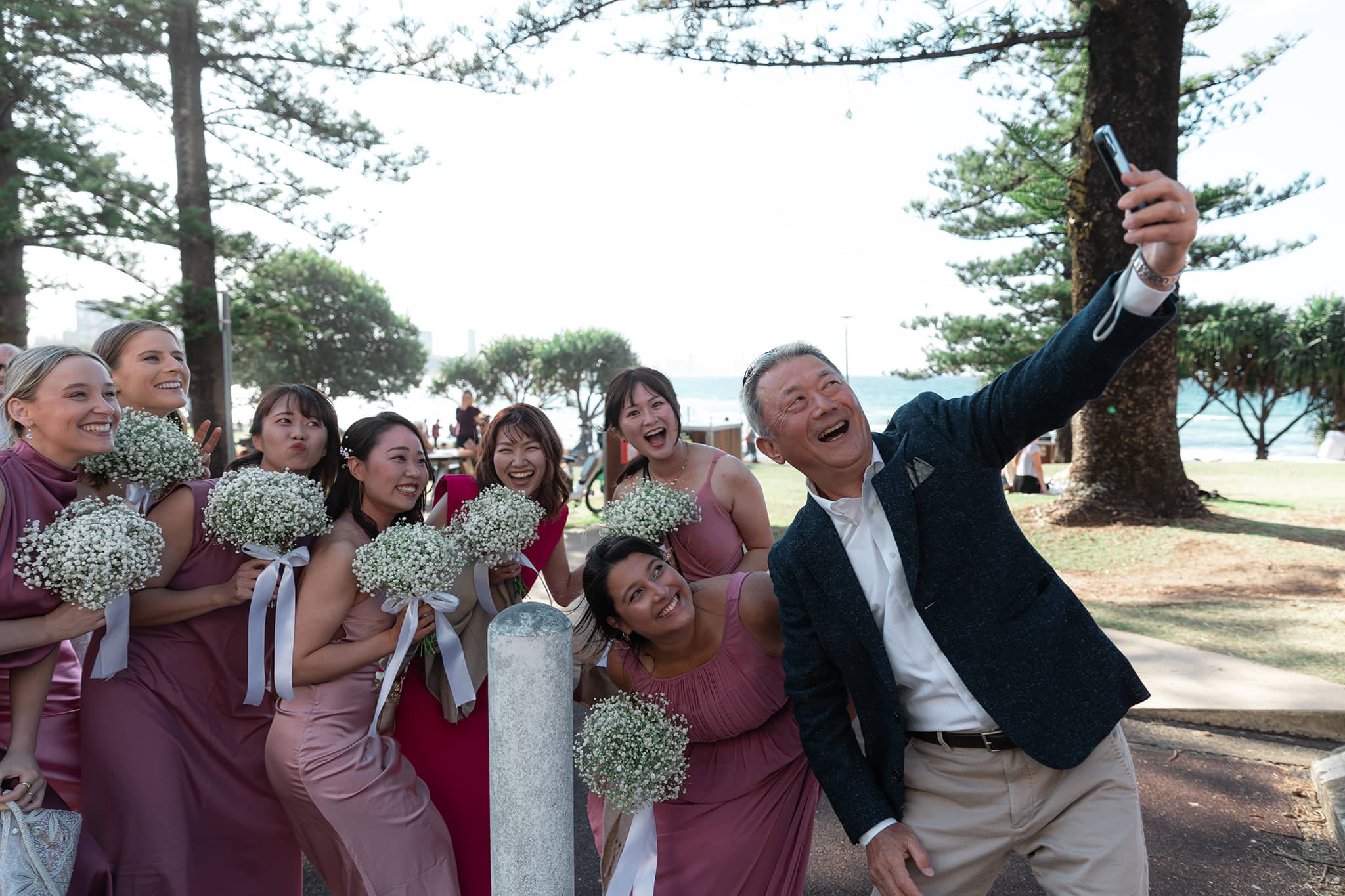 Brides dad taking a selfie with the bridal party on arrival.
