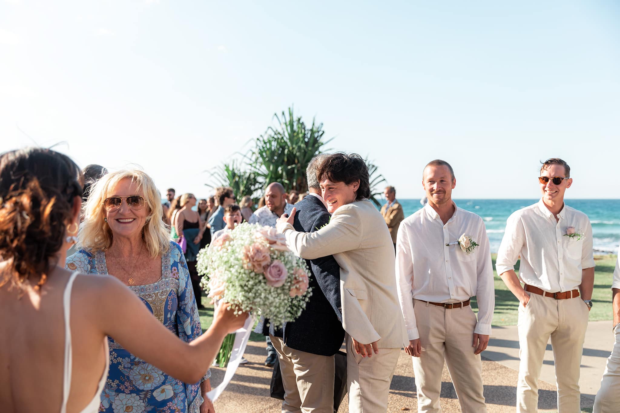 Wedding ceremony at Burleigh Heads on the Gold Coast, by Mooi photography.