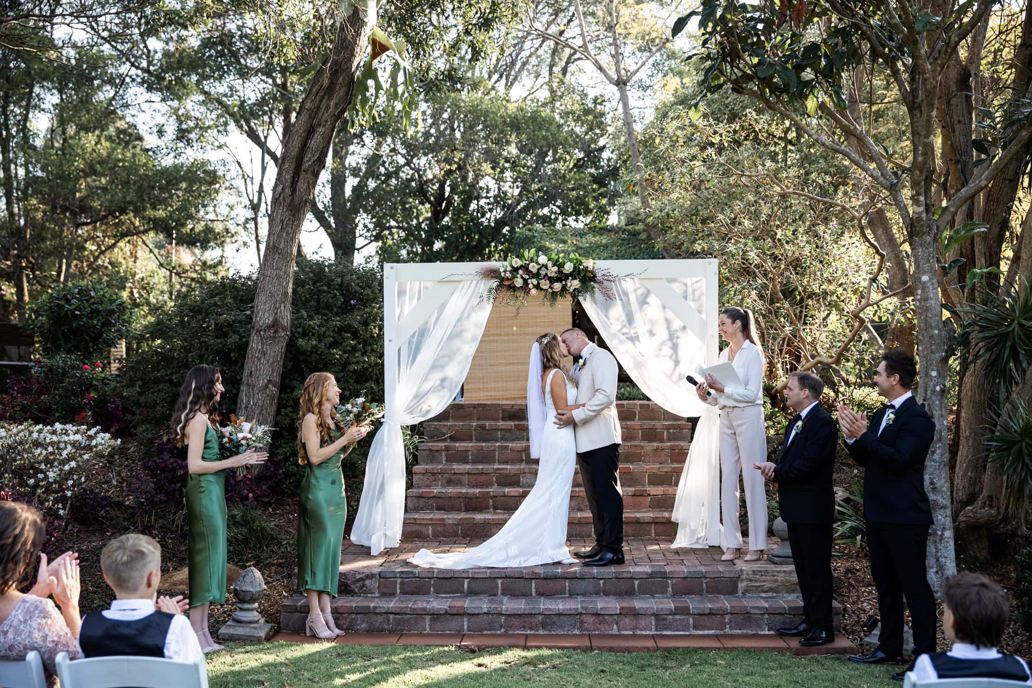 Wedding ceremony with wedding couple at the Secret Garden Estate, Tamborine Mountain.