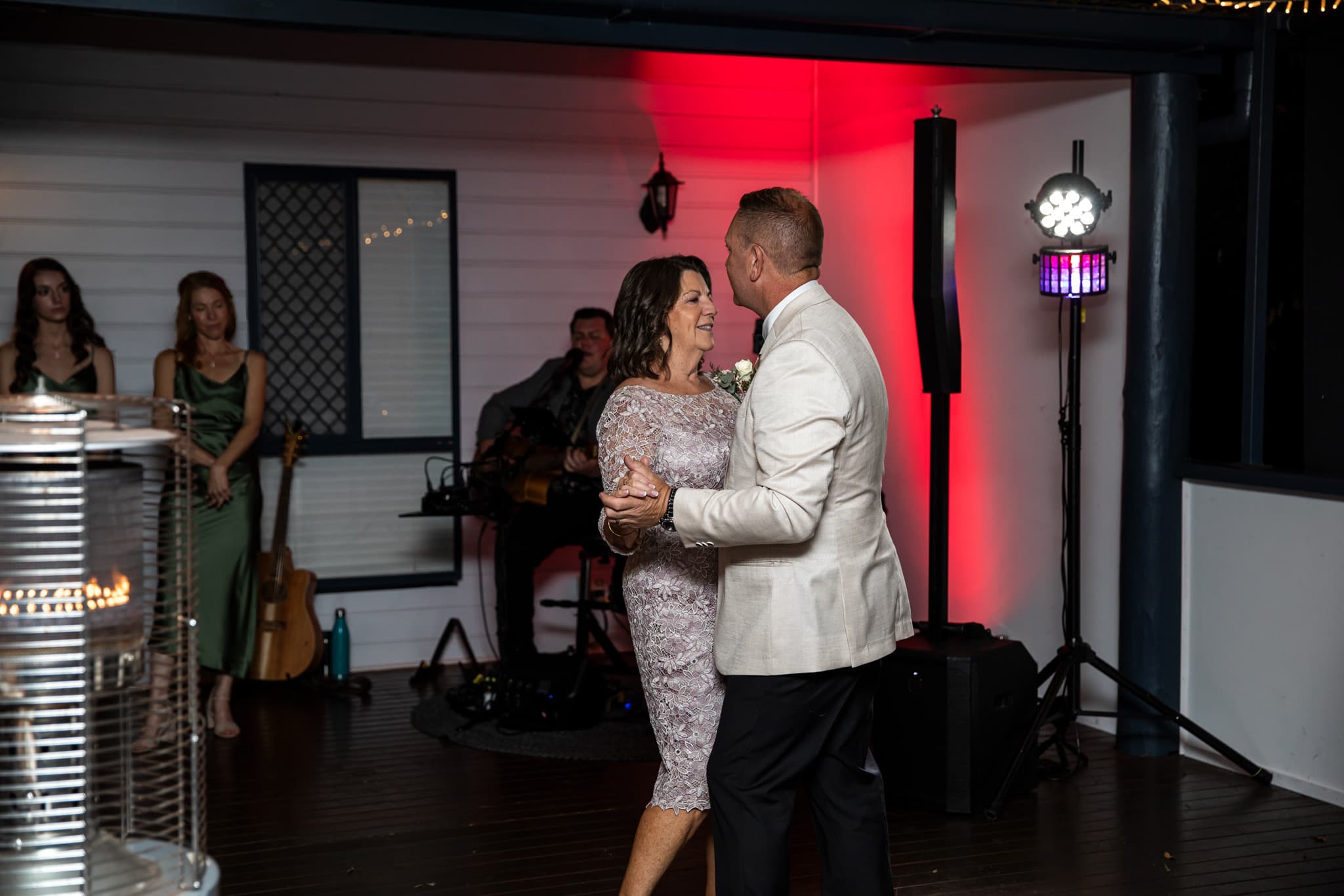 Wedding couple dancing at the reception photos at The Secret Garden Estate, Tamborine Mountain.