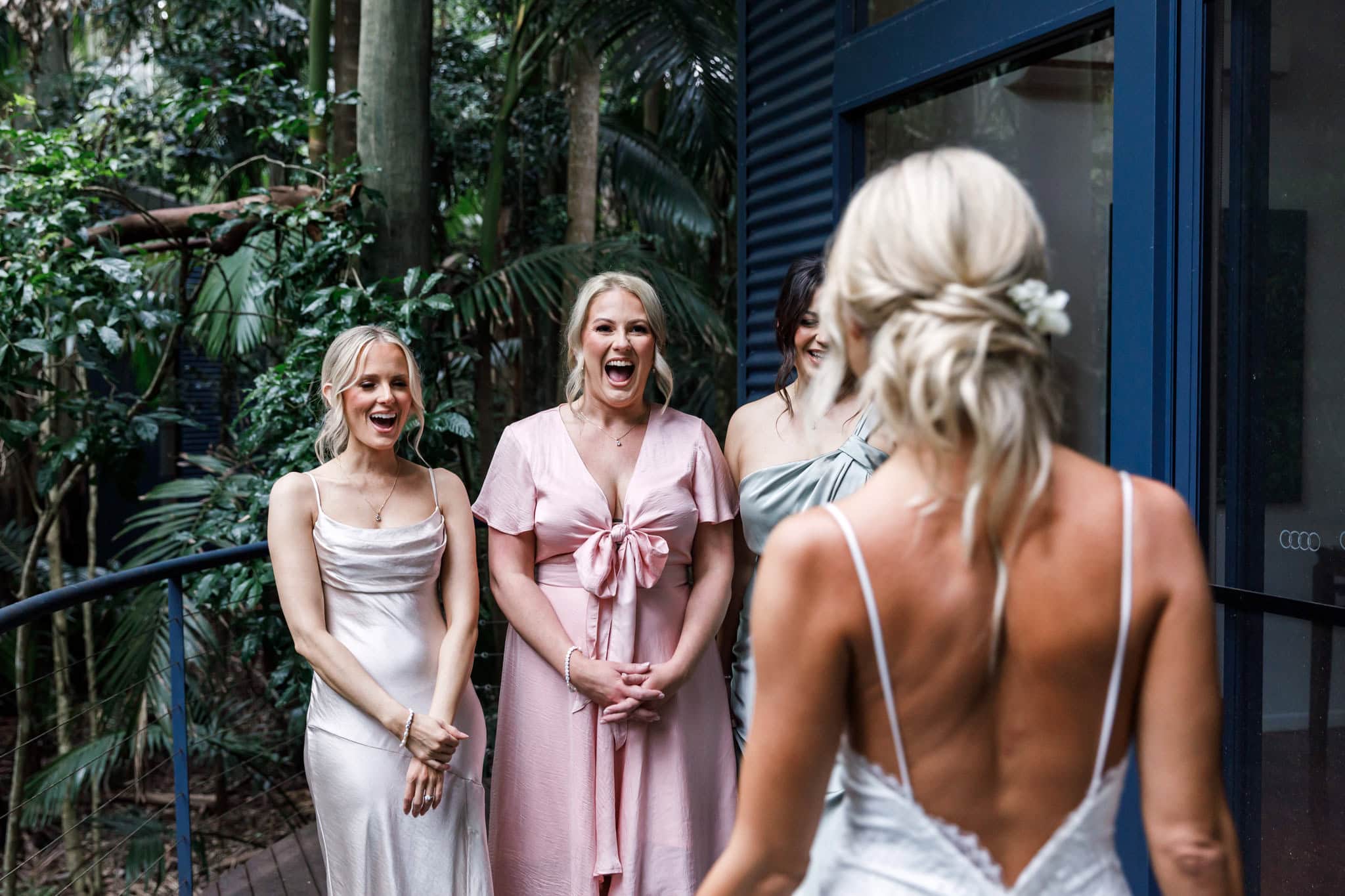Dress reveal to bridal party on wedding day.